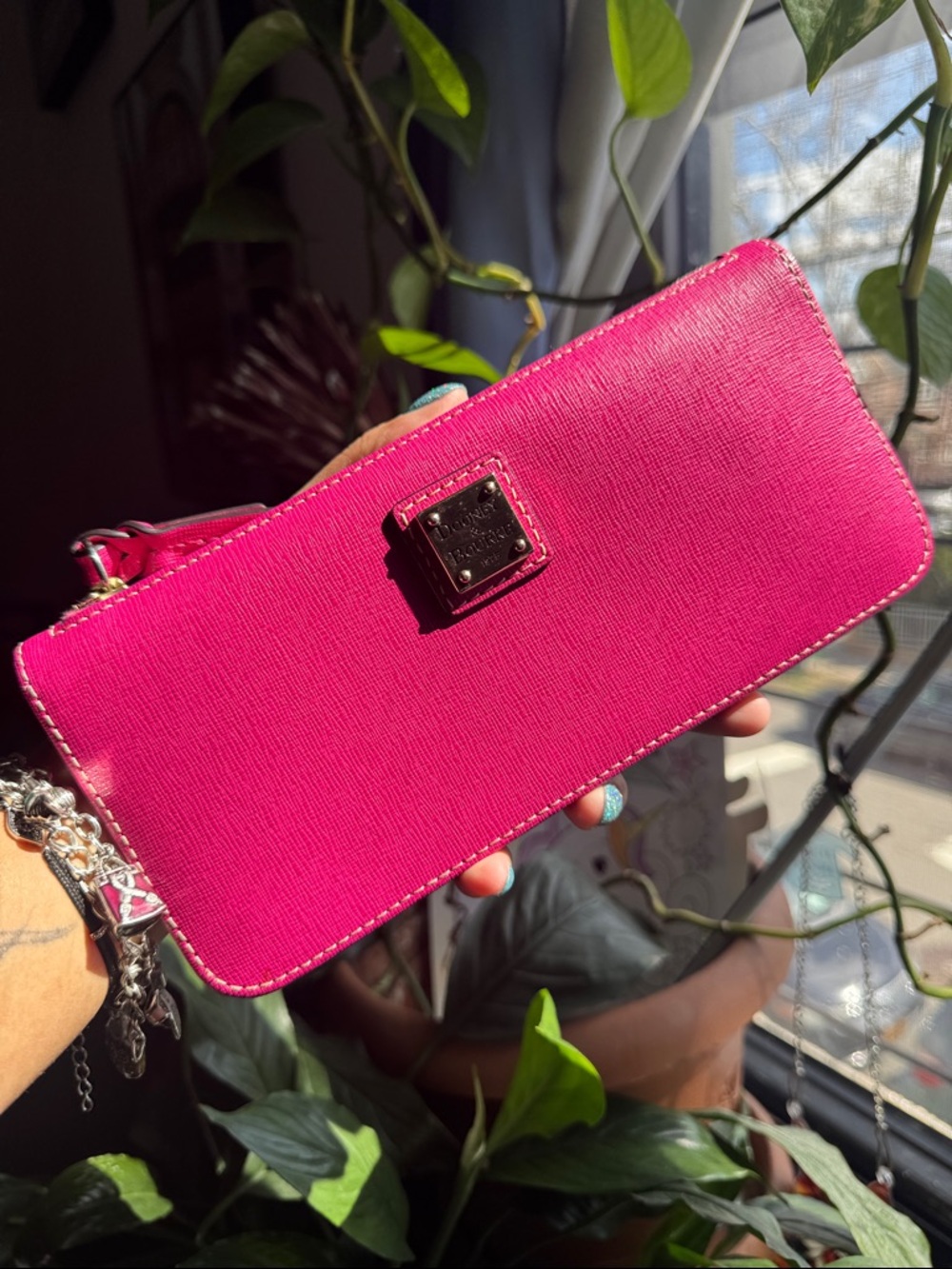 Dooney & Bourke Magenta clutch wallet.